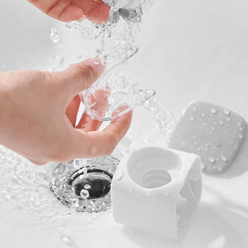 Wall-mounted toothpaste squeezer