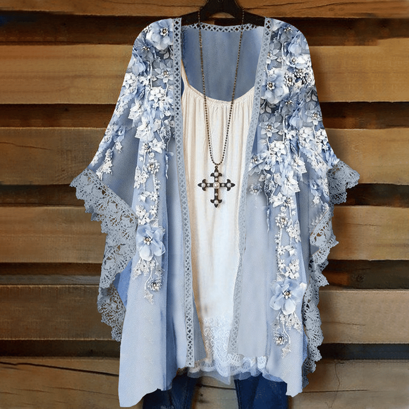 Cardigan en dentelle avec empiècements fleuris
