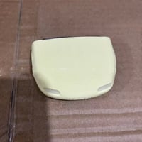 Retro autosleutelhanger met open koplampen