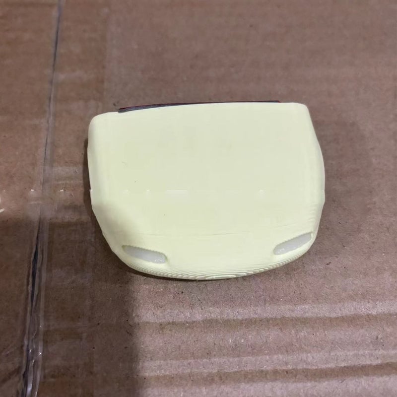 Retro autosleutelhanger met open koplampen