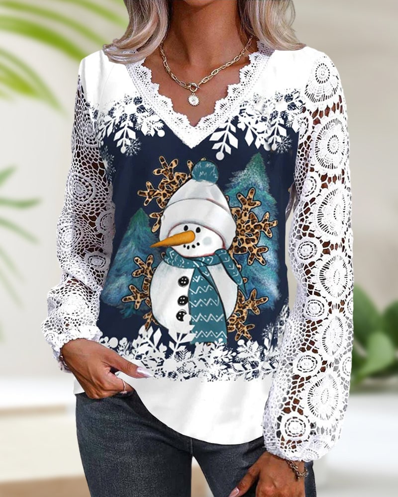 Bluse med blonde- og snemandsmønster