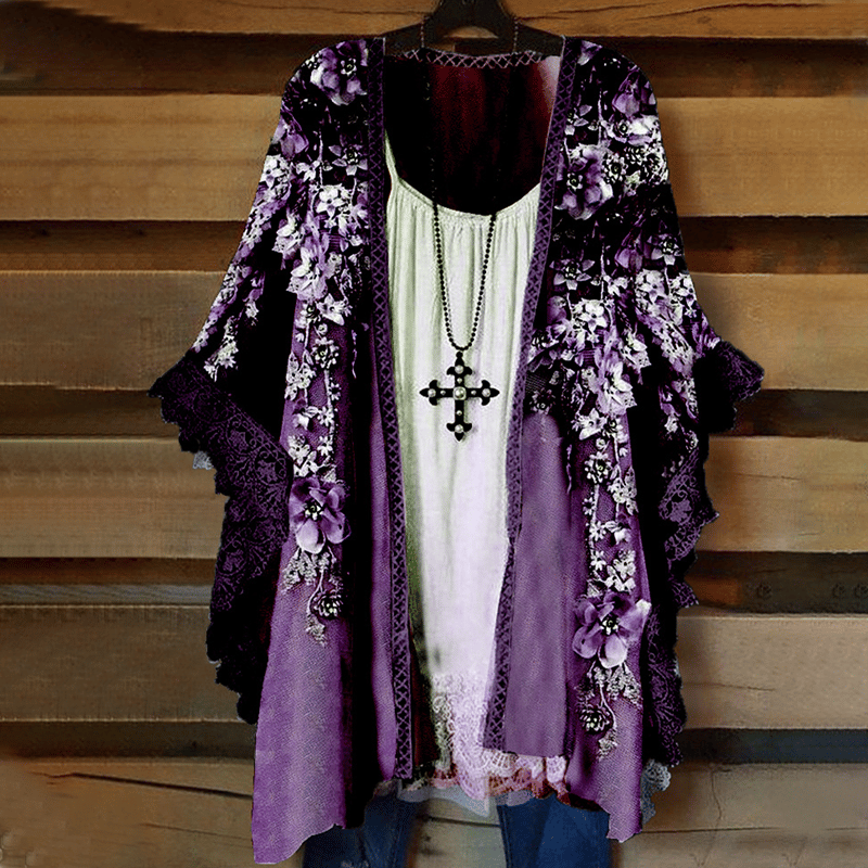 Cardigan en dentelle avec empiècements fleuris
