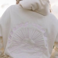 Oversized hoodie met zonsondergang achtervolgen