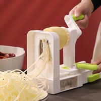 Duizend geraspte aardappelmaker