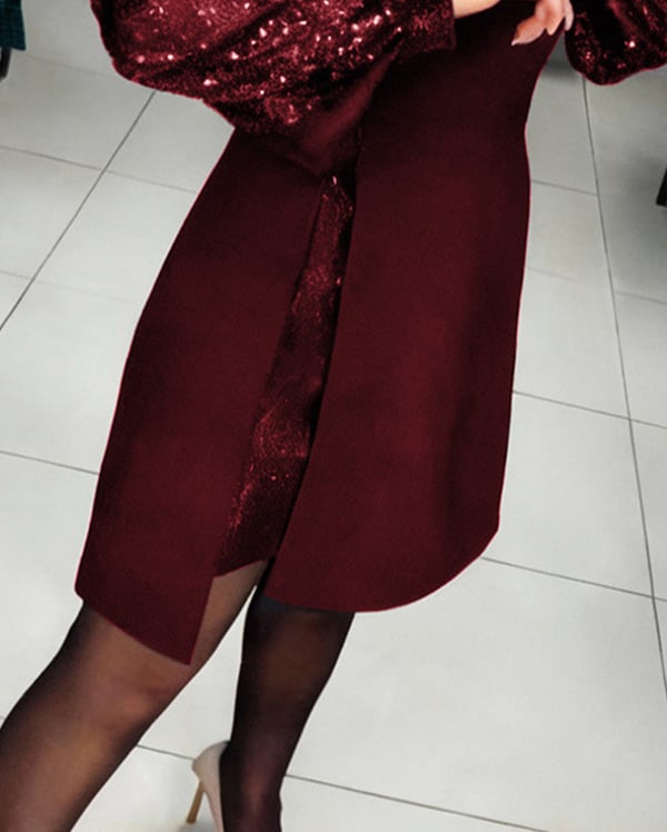 Elegantes Kleid mit Puffärmeln und Patchwork-Details