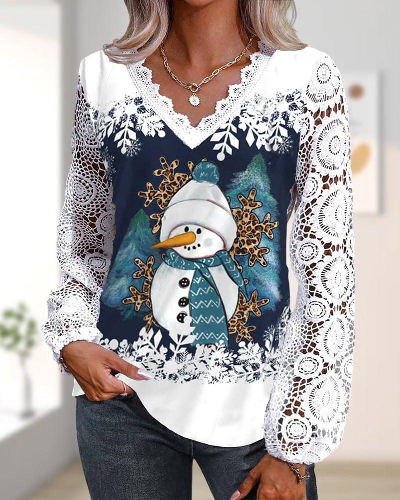 Bluse med blonde- og snemandsmønster