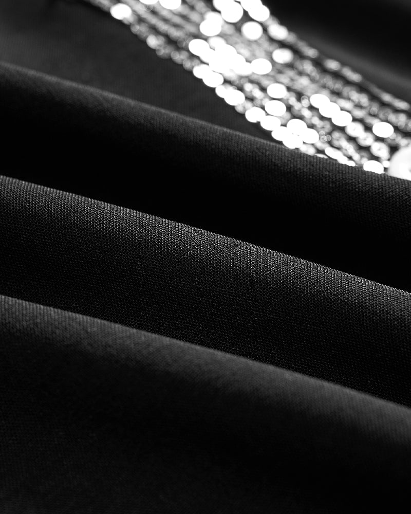 Bluzka z cekinami zapinana na guziki