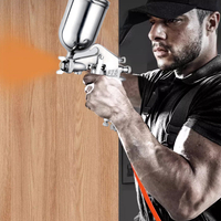 Pneumatisk spraypistol med topbeholder