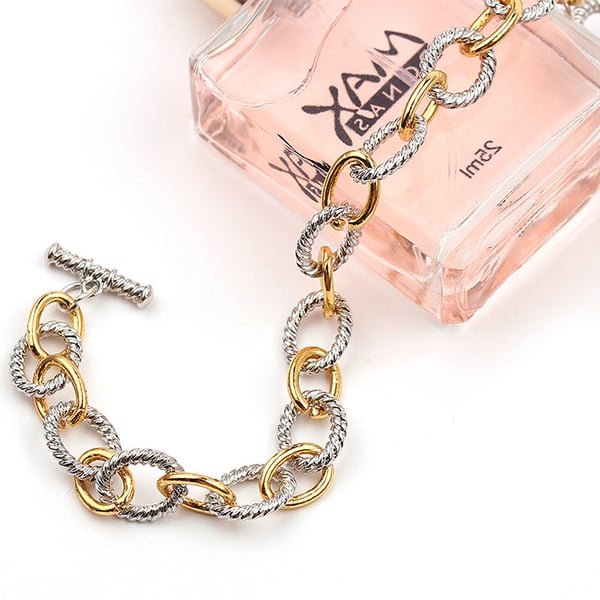 Zweifarbige Armspange mit Knoten-Design