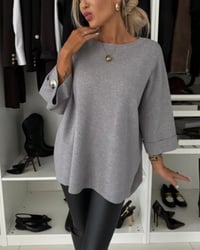 Mote ensfarget genser med rund hals