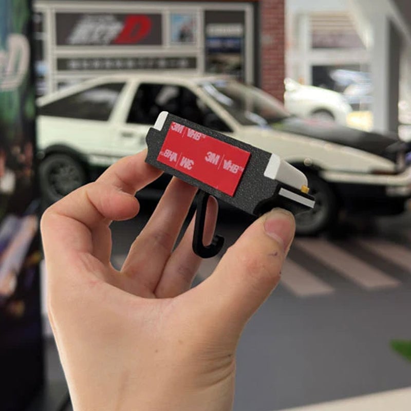 Retro autosleutelhanger met open koplampen