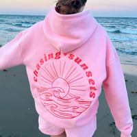 Oversized hoodie met zonsondergang achtervolgen