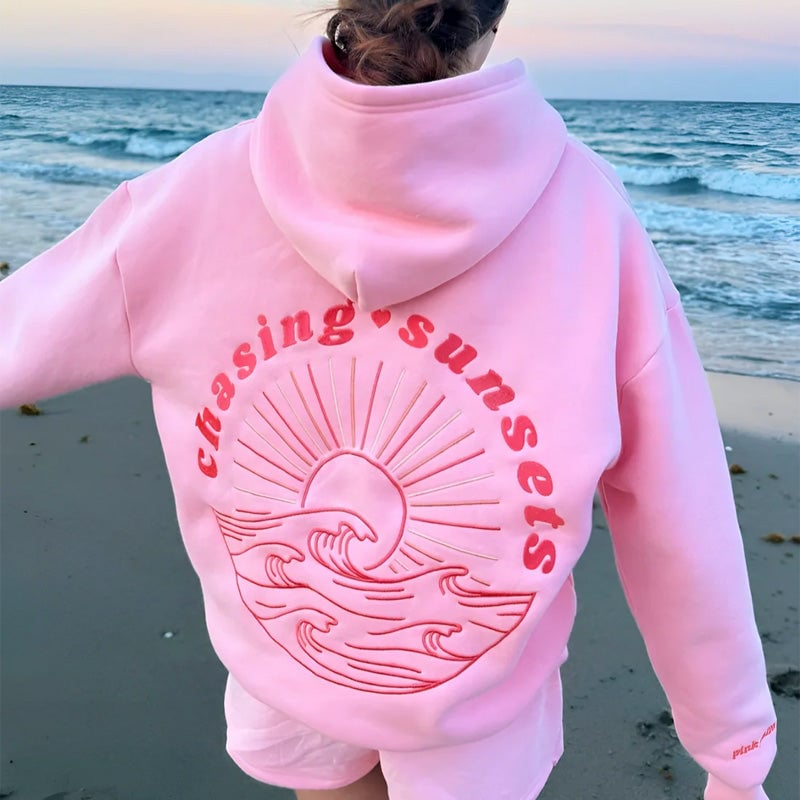 Oversized hoodie met zonsondergang achtervolgen
