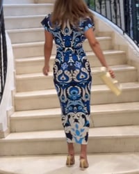 Elegant slå-om-kjole med print
