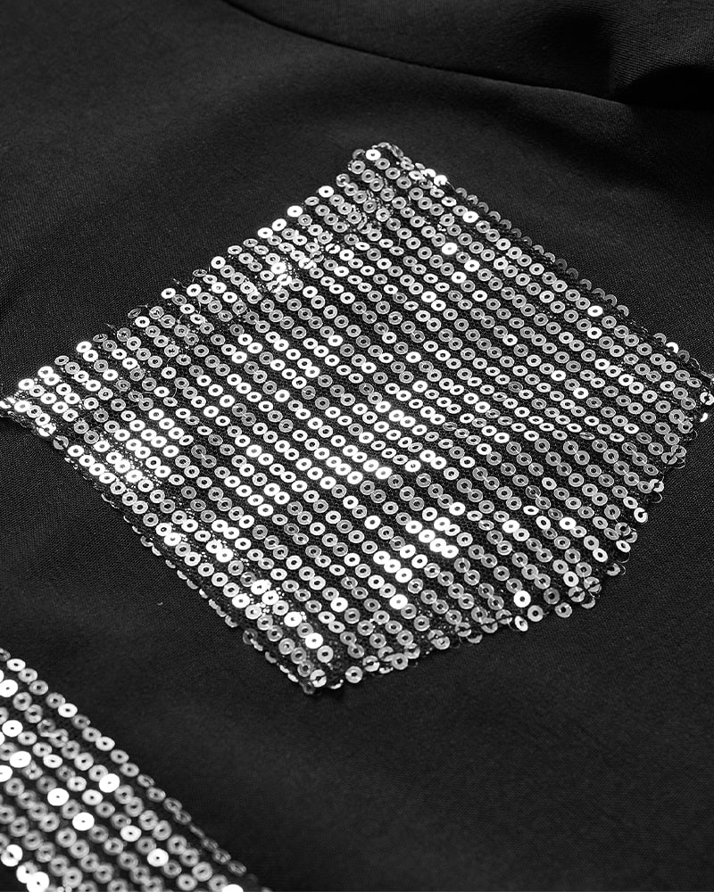 Bluzka z cekinami zapinana na guziki