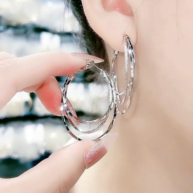 Boucles d'oreilles créoles multicouches