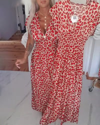 Elegantes Kleid mit Leopardenmuster und V-Ausschnitt