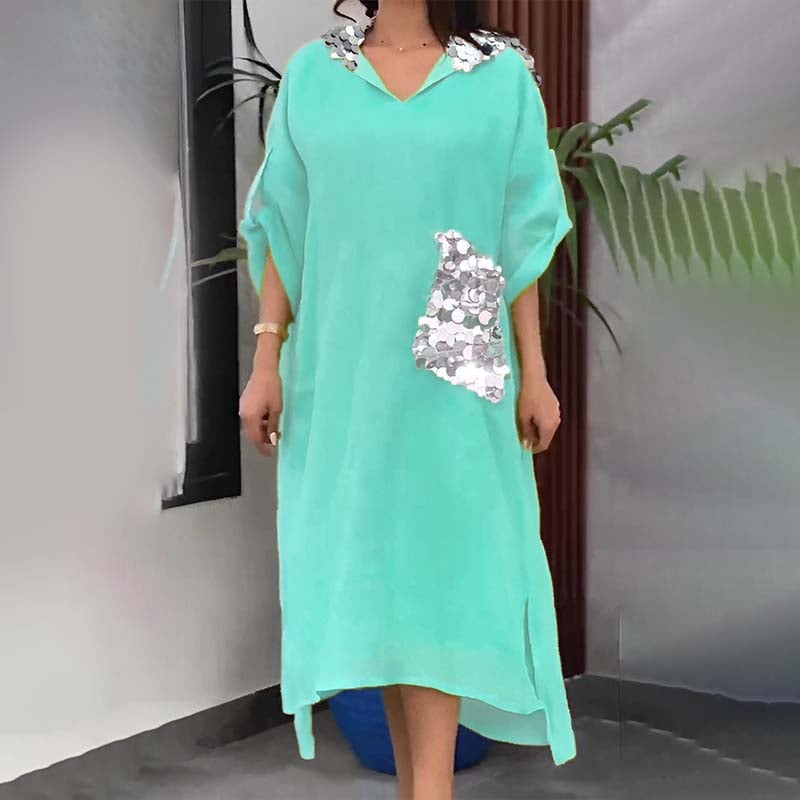 Maxi abito con cappuccio in paillettes a squame di pesce