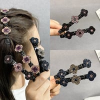 Haarclip met drie bloemen aan de zijkant