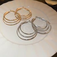 Boucles d'oreilles créoles multicouches