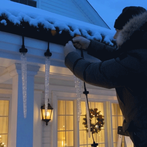 Outdoor icicle lights installed with convenient hanging hooks