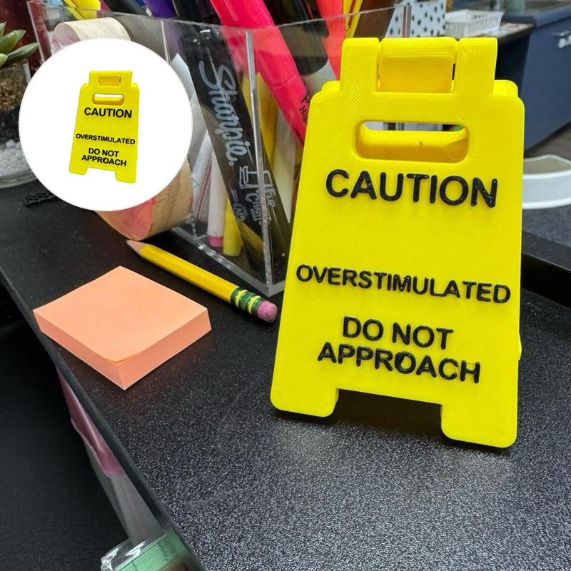Vorsicht: Überstimulierendes Schild für den Schreibtisch