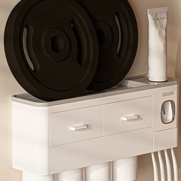 Toothbrush holder with a drawer