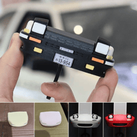 Retro autosleutelhanger met open koplampen