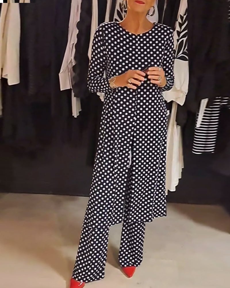 Elegant pak met stippen en split