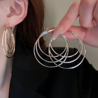 Boucles d'oreilles créoles multicouches