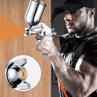 Pneumatisk spraypistol med topbeholder