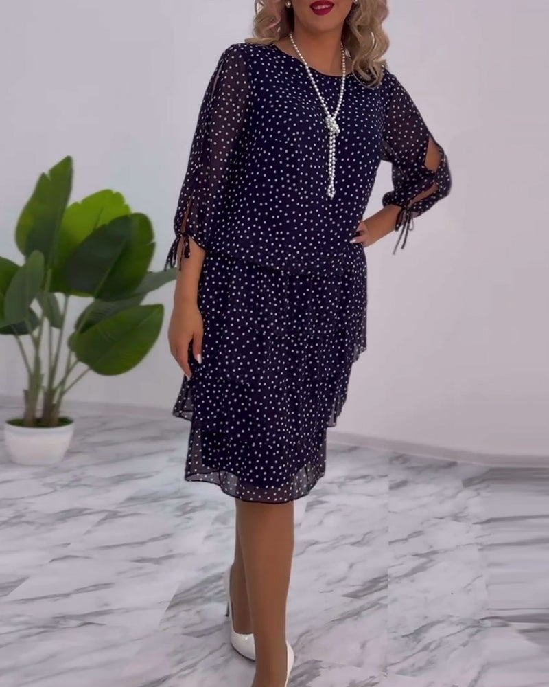 Robe élégante superposée à imprimé pois