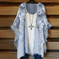 Cardigan en dentelle avec empiècements fleuris