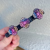 Haarclip met drie bloemen aan de zijkant