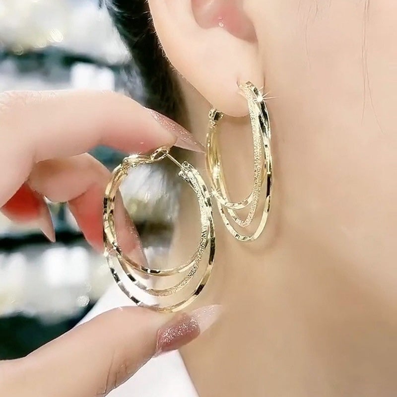 Boucles d'oreilles créoles multicouches