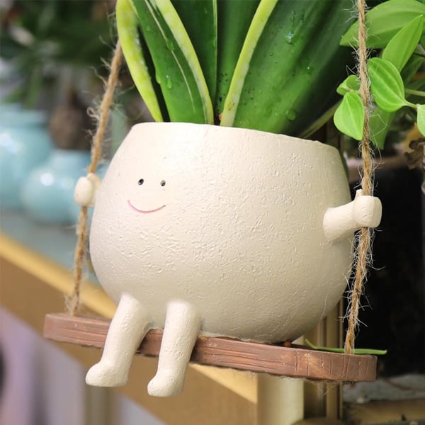 smiley schommel bloempot