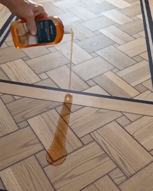 Demonstration of mopping a floor