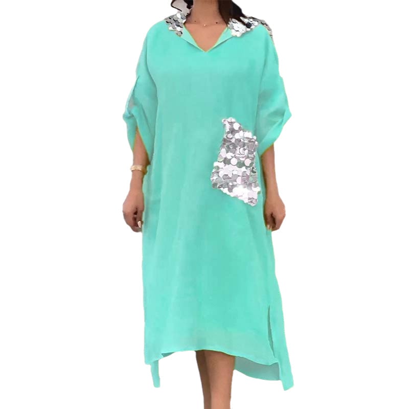 Maxi abito con cappuccio in paillettes a squame di pesce