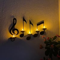 Svart musiknotvägglampa