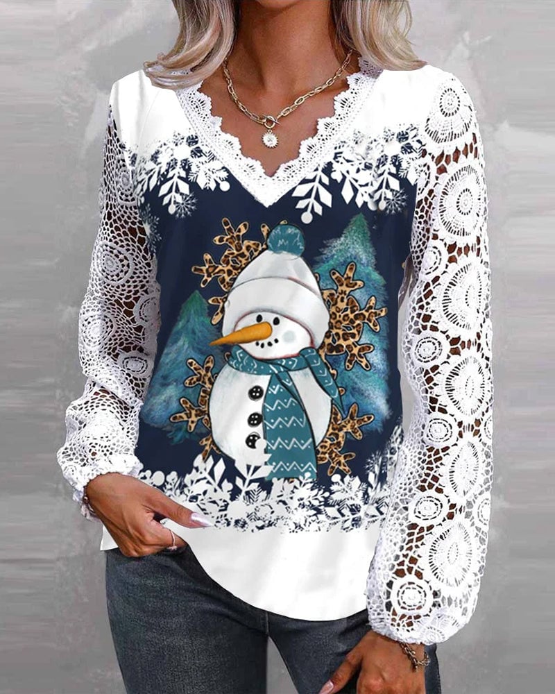 Bluse med blonde- og snemandsmønster