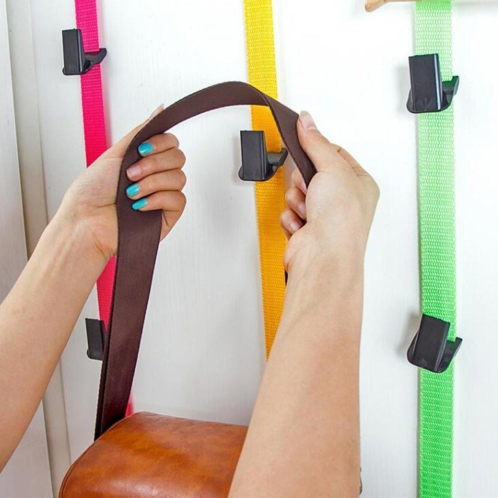 The Multi-Function Carrying Strap Over The Door