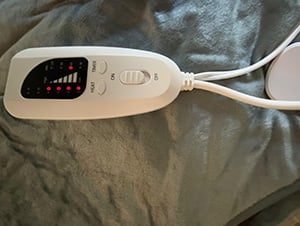 Heating pad wrapped around a leg
