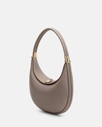 Ensfarvet elegant halvmåneformet skuldertaske