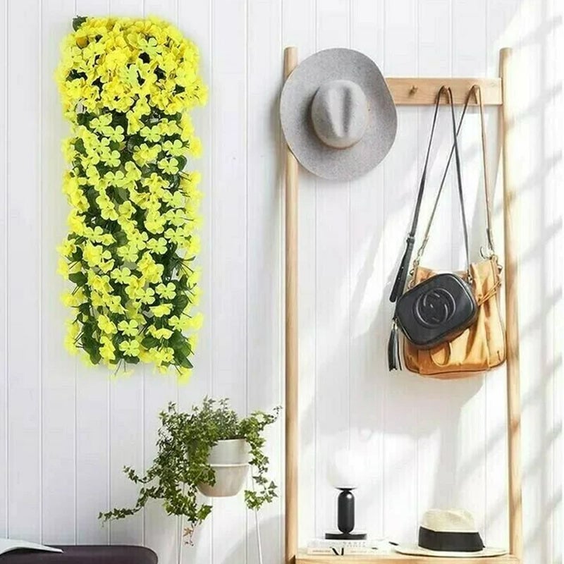 Levendige kunstmatige hangende orchideeën tros