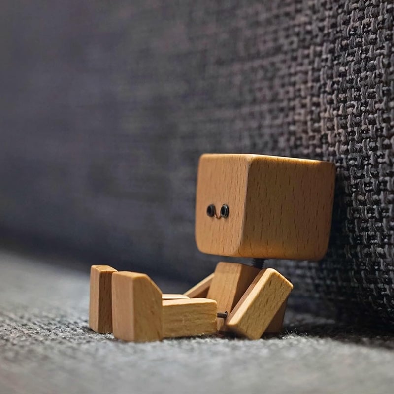 Figurine d'homme en bois tremblant