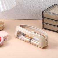 Liten genomskinlig sminkväska