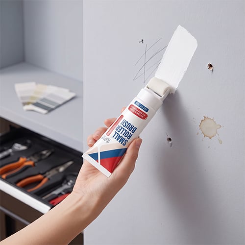 All-in-one wall repair roller with built-in applicator