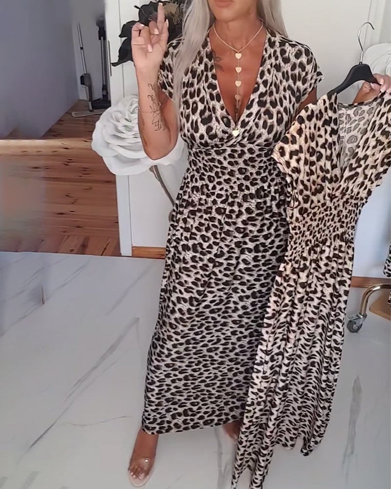 Elegante jurk met luipaardprint en v-hals