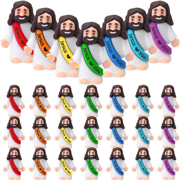 Mini-Jesus-Figuren mit dem Slogan „Jesus liebt dich“