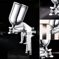 Pneumatisk spraypistol med topbeholder